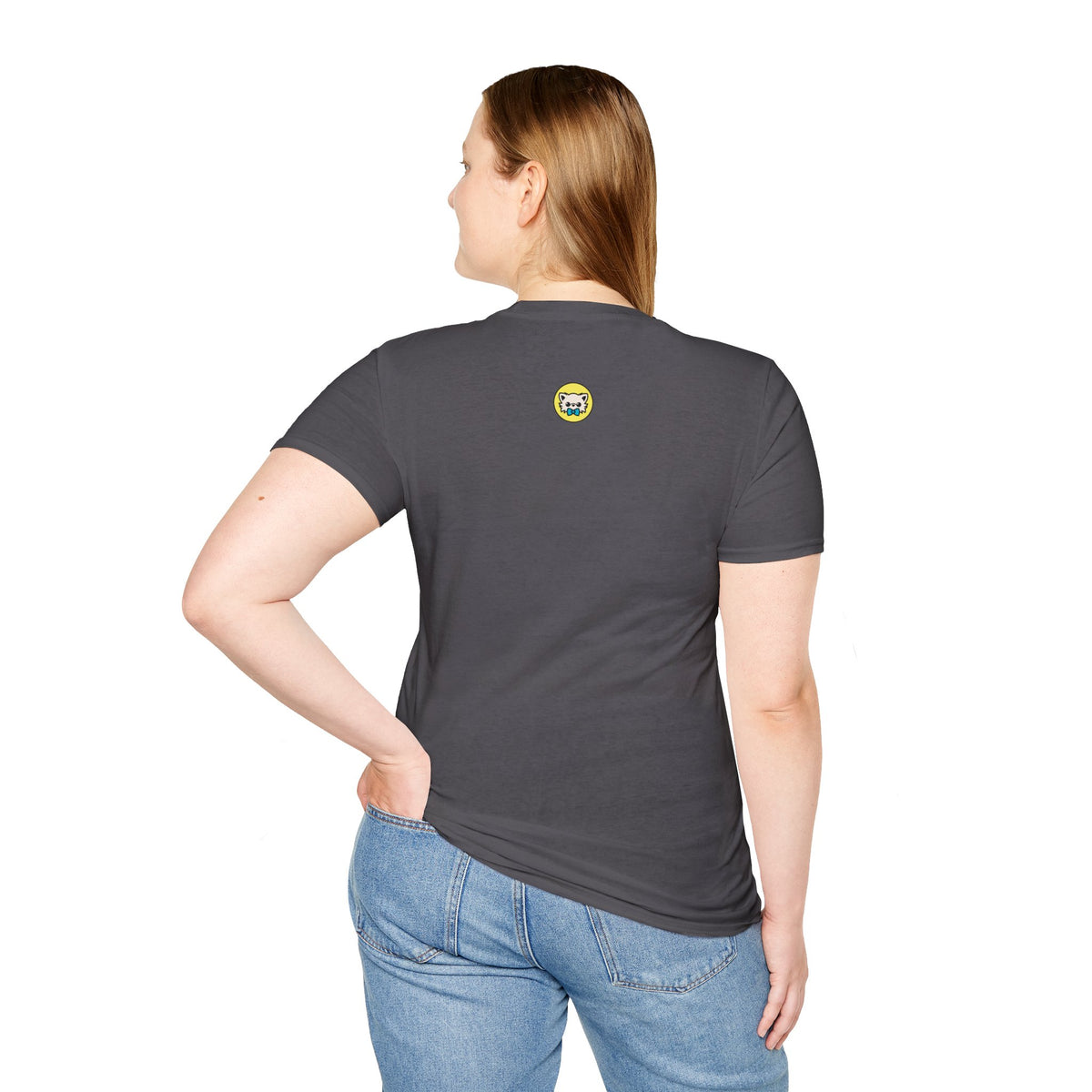 Back view of a person wearing a charcoal unisex t-shirt with a small round yellow graphic centered below the neck, showing two cartoon chihuahuas dressed as gentle vampire characters.