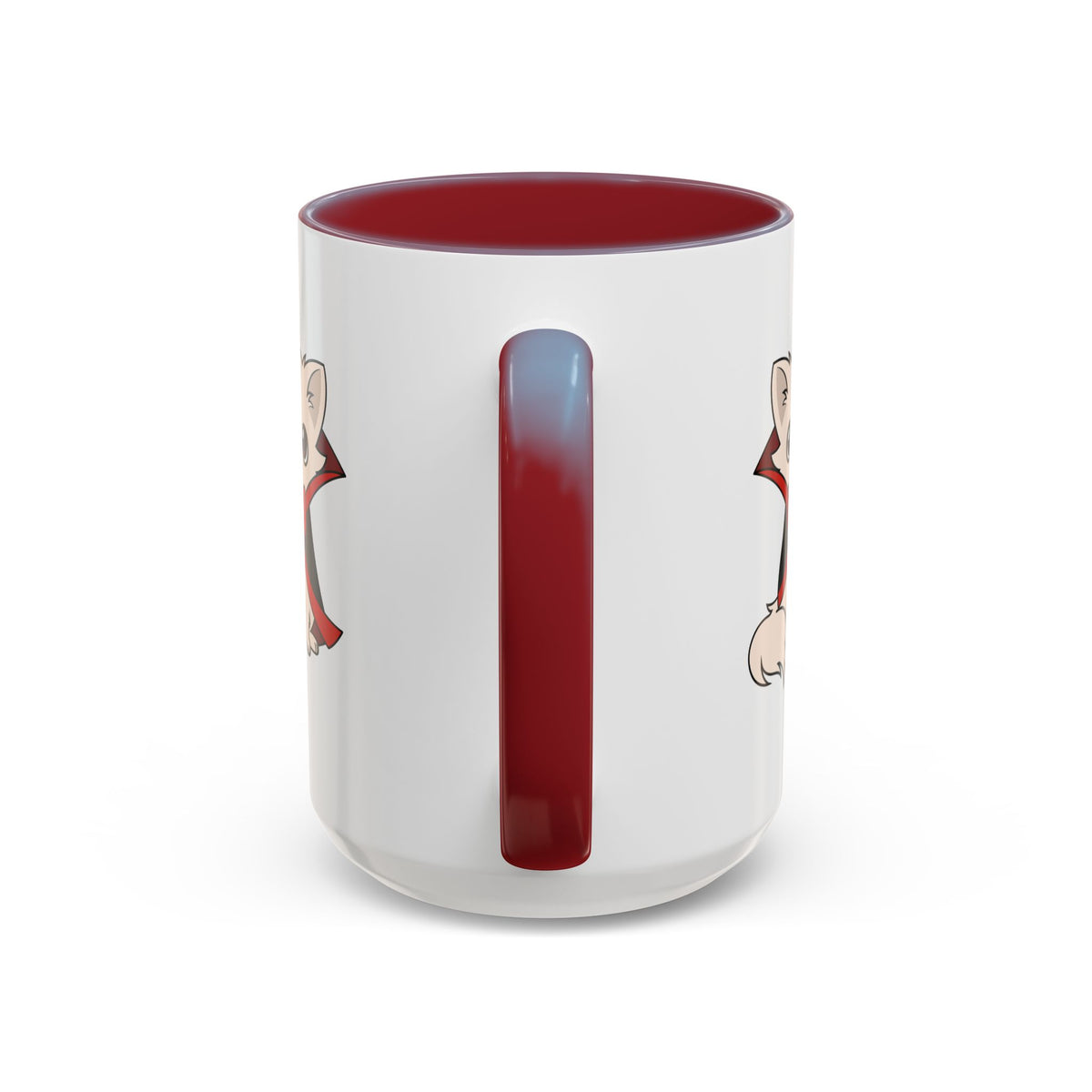 Back view of a white accent coffee mug with a maroon handle and interior, showing partial illustrations of a small vampire-costumed chihuahua on both sides near the edges.