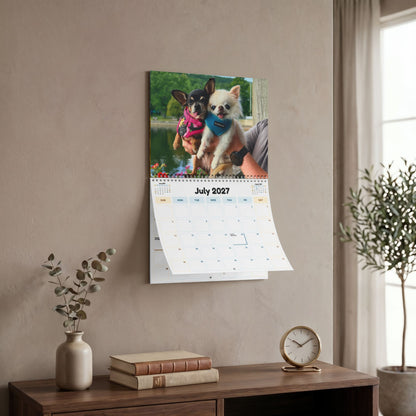 2027 wall calendar displayed in a living room, open to July.
