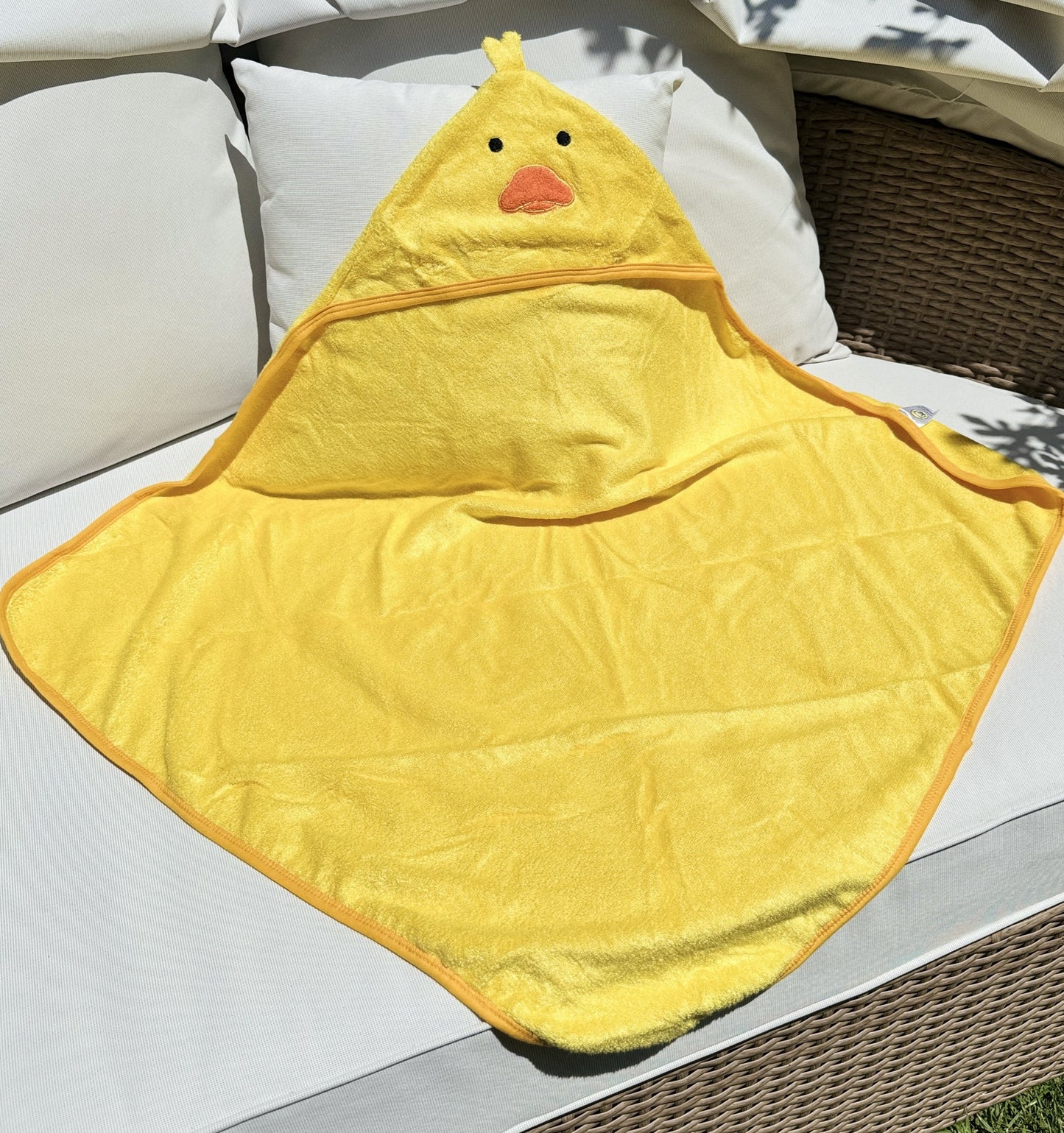 Ducky Towel Laying Flat on Garden Bed