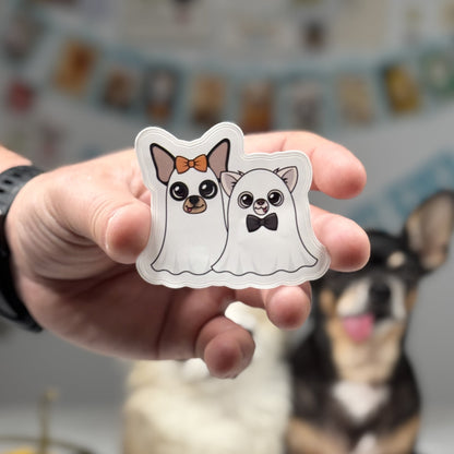 Ghost Chis Sticker featuring Maya and Cedric, two Chihuahuas dressed in ghost costumes with bow ties, perfect for Halloween decorations.