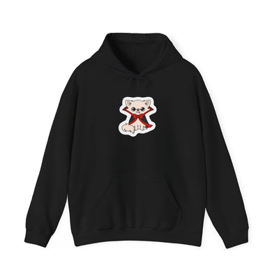 Front view of a black hoodie featuring Cedric, a cream-colored chihuahua sitting calmly in a black cape with red lining and a red bow, printed at the center chest.
