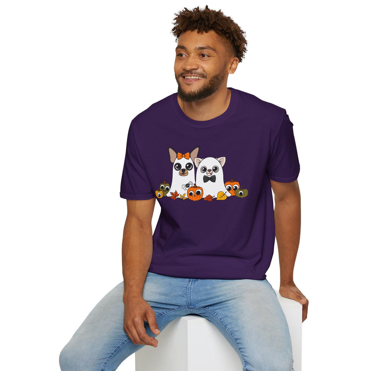 Man seated wearing the purple Boo Crew T-shirt.