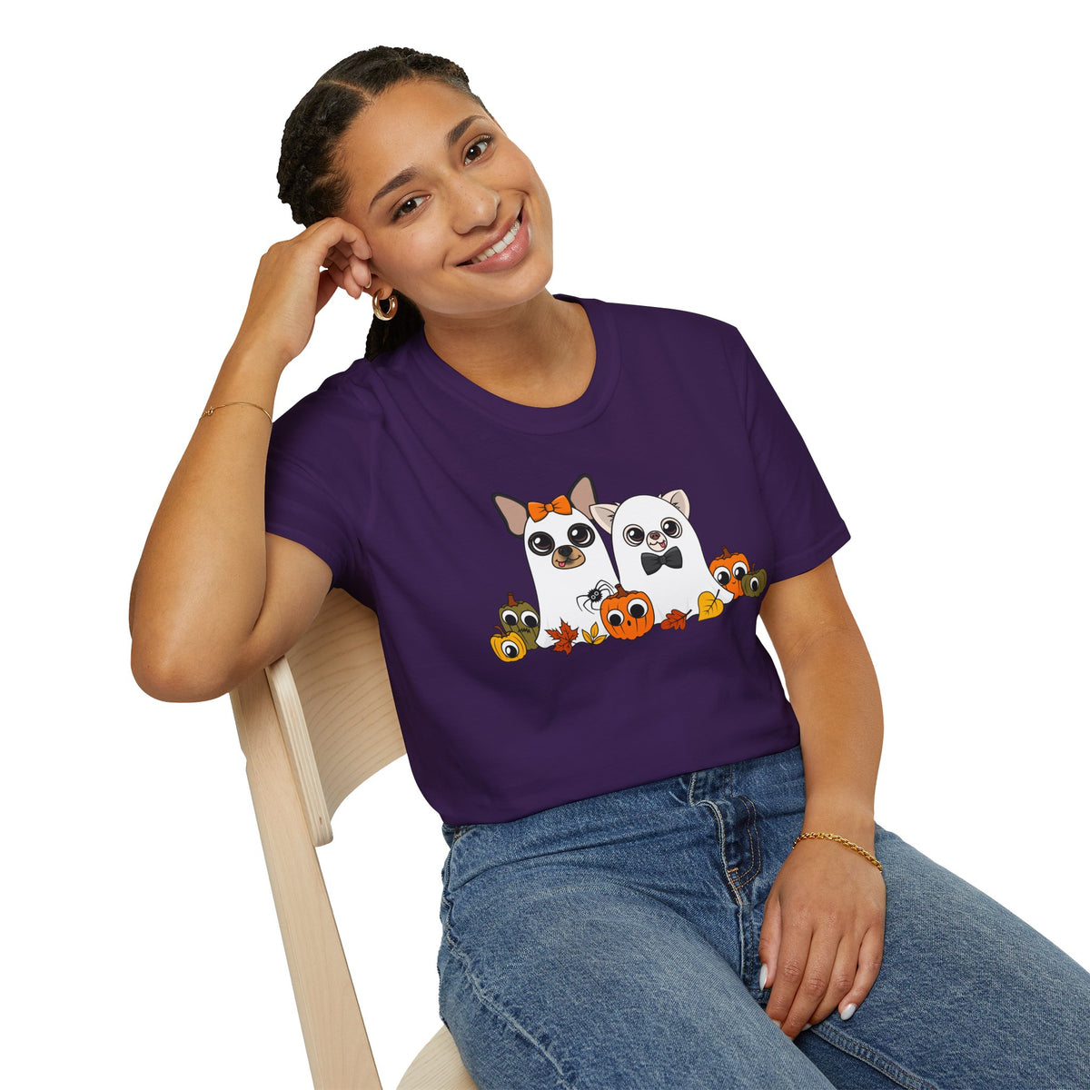 Woman seated indoors wearing the purple Boo Crew T-shirt.