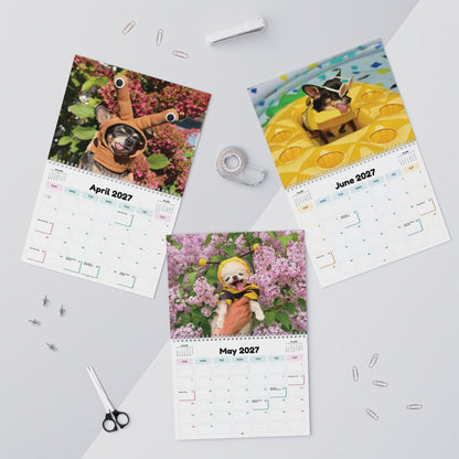 Flat lay showing April, May and June 2027 calendar pages with colorful seasonal grids.