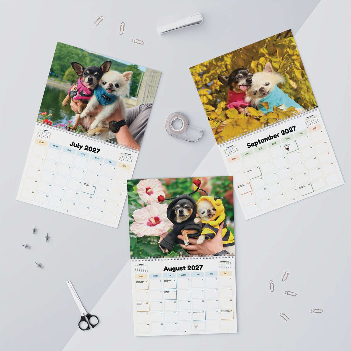 Flat lay showing July, August and September 2027 calendar pages with colorful seasonal grids.