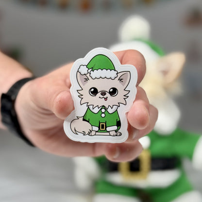 Elf Cedric Sticker featuring a Chihuahua in a green elf costume, perfect for holiday decorations and Christmas gifts.