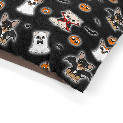 Close view of the black Halloween Chis print on the pet bed fabric, with ghost and vampire Chihuahuas.
