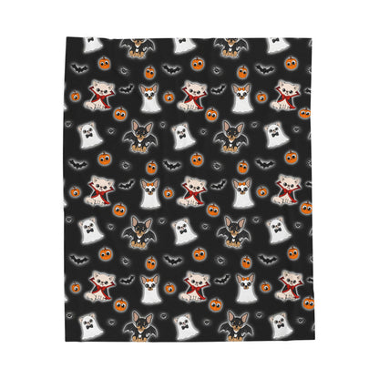 Black Halloween Chis velveteen blanket shown flat with a repeating ghost and vampire Chihuahua pattern.