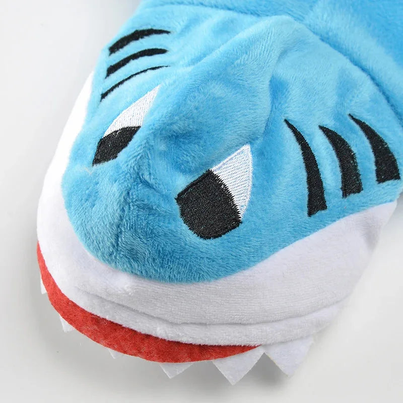 Close-up of the blue shark hood with embroidered eyes and gills, red mouth and white fabric teeth