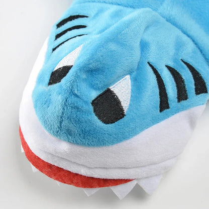 Close-up of the blue shark hood with embroidered eyes and gills, red mouth and white fabric teeth