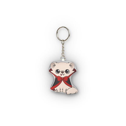 Reverse side of Vampire Cedric mini plush keychain wearing a black and red cape.