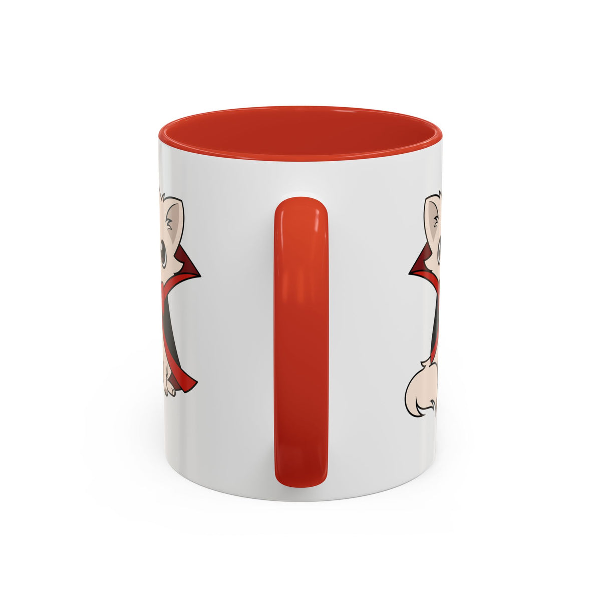 White ceramic mug with a red interior and handle, showing partial views of a small front-facing chihuahua in a black cape with red lining on both sides of the handle.