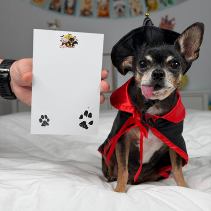 Reverse of the Vampire Chis Pawdograph photo card, with Cedric and Maya’s artwork and paw prints around a blank dedication area.