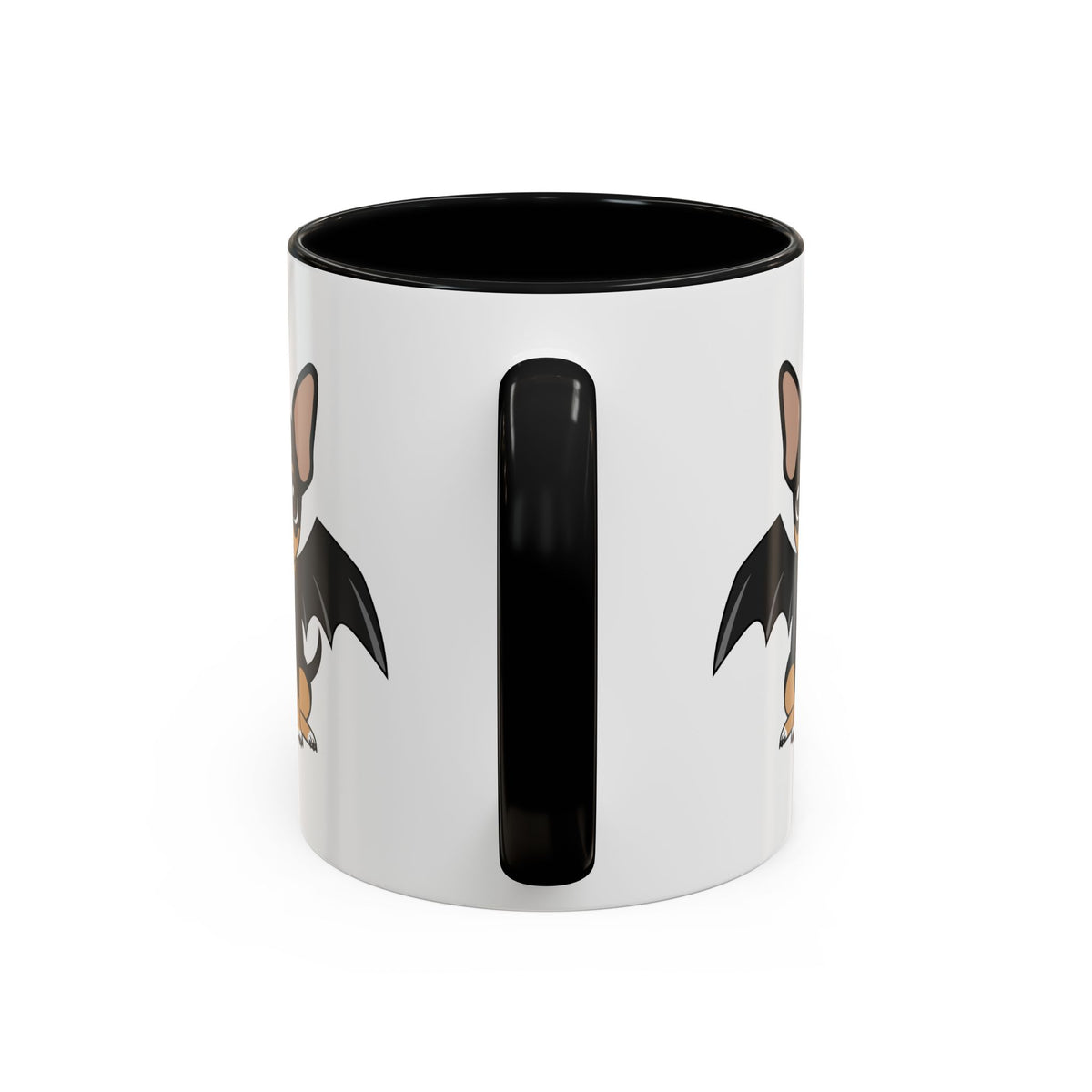 White accent coffee mug with black interior and handle, showing partial views of the Vampire Maya chihuahua with bat wings on each side of the handle.